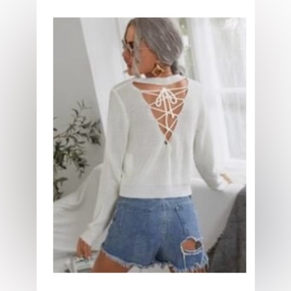 White cropped sweater with lace up detail back